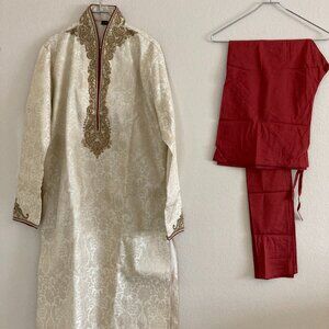 Richly embroidered gold and cream Sherwani with  red silk Churidar